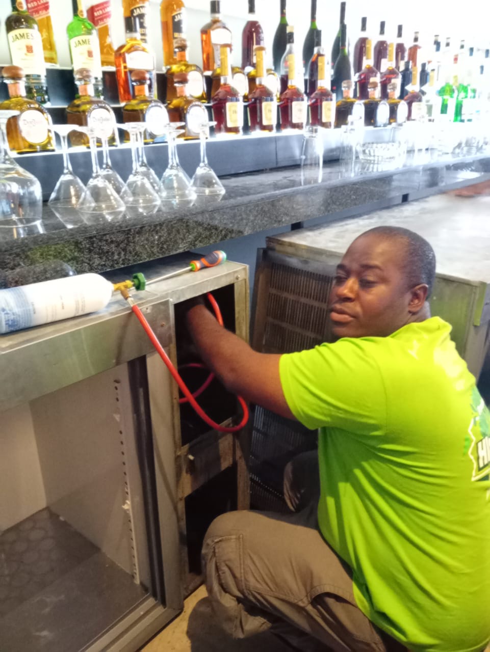 Technician servicing an appliance